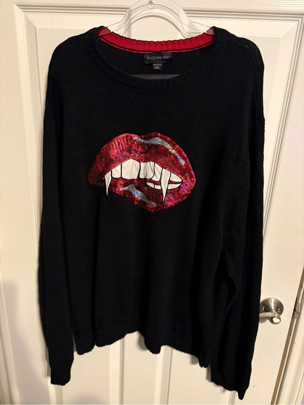 465- Blizzard Bay Black Sweater with Red Sequin vampire Lip Graphic